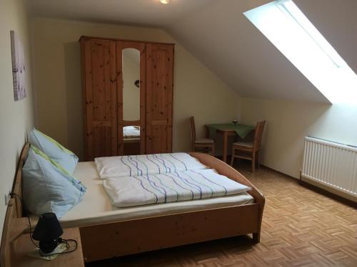 Posteľ alebo postele v izbe v ubytovaní Reiterhof Rössler