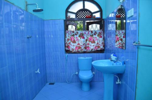 Vonios kambarys apgyvendinimo įstaigoje Lilly Palace Villa Guest House