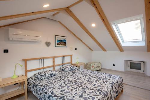 Posteľ alebo postele v izbe v ubytovaní Apartments Villa Adrienne
