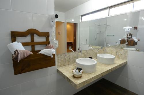 Phòng tắm tại Oasis Tajaja Pousada