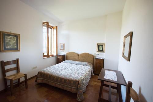 เตียงในห้องที่ Casa Dei Lecci