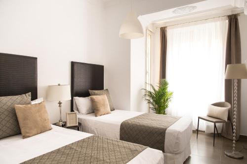 Ένα ή περισσότερα κρεβάτια σε δωμάτιο στο Oliag I Apartment Ruzafa