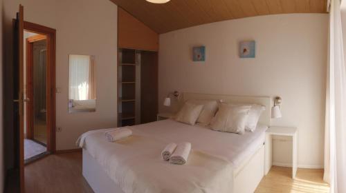 Postel nebo postele na pokoji v ubytování SD House
