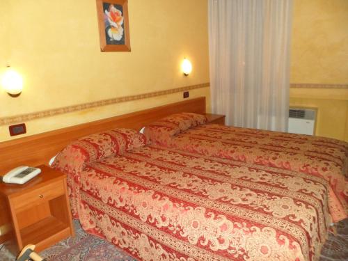 Cama o camas de una habitación en Motel Tempio