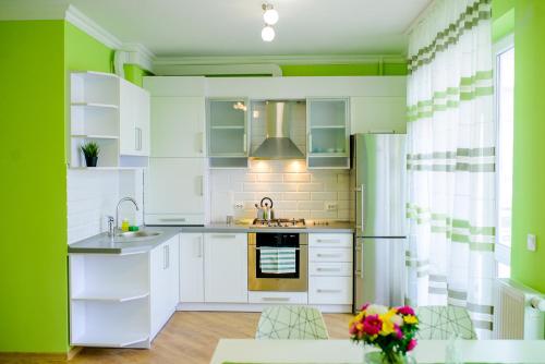 Η κουζίνα ή μικρή κουζίνα στο Modern apartment in 10 min from city center