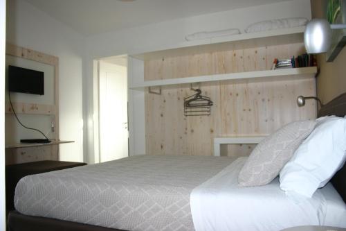 Postel nebo postele na pokoji v ubytování Agriturismo Vigna Corallo