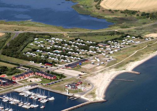 an aerial view of a marina with many boats at Hotel Lidenlund in Lemvig