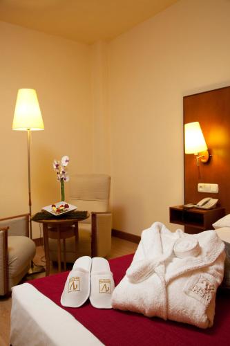 Letto o letti in una camera di Vincci Ciudad de Salamanca