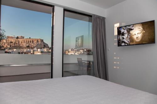 Luxury Penthouse touching the Acropolis by GHH