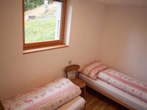 Postel nebo postele na pokoji v ubytování Chalet Seviann