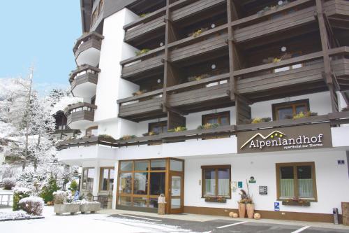 an apartment building with a sign that reads antiparallodon at Alpenlandhof in Bad Kleinkirchheim