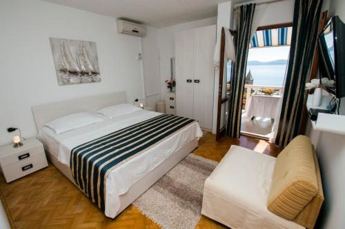 Ліжко або ліжка в номері Villa Antonio