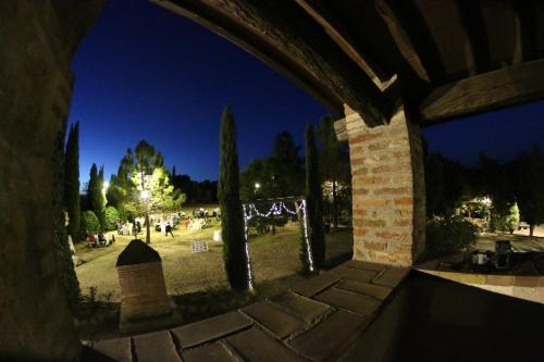 a view of a park at night from a building at Agriturismo Materno in Radicondoli
