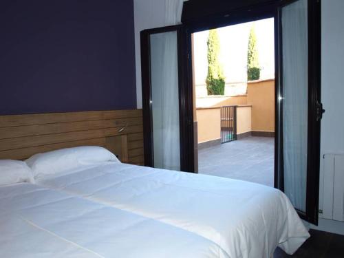 Katil atau katil-katil dalam bilik di Hotel Las Casas de Pandreula