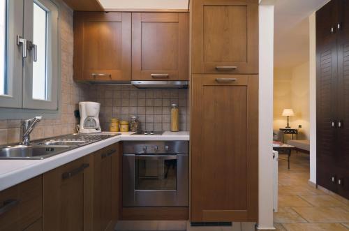 Harmony Hotel Apartmentsにあるキッチンまたは簡易キッチン