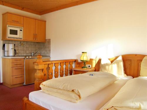 Kuchyň nebo kuchyňský kout v ubytování Haus am Platz - Weitgasser