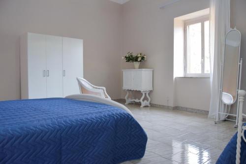 Katil atau katil-katil dalam bilik di B&B Al Castello di Lettere