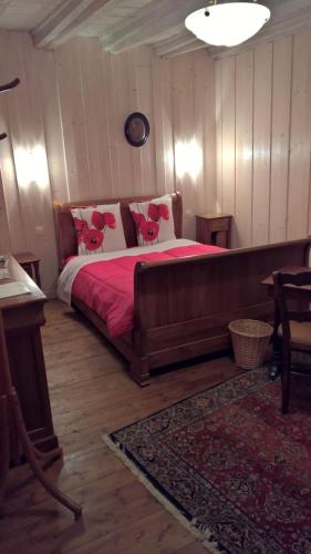 Ένα ή περισσότερα κρεβάτια σε δωμάτιο στο Chambre d Hote 1873