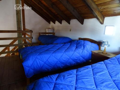 Postel nebo postele na pokoji v ubytování Cabanas Cucu