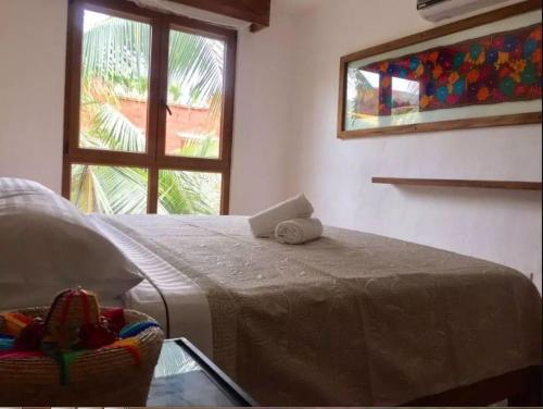 Кровать или кровати в номере Casa Lotería -Pueblito Sayulita- Colorful, Family and Relax Experience with Private Parking and Pool
