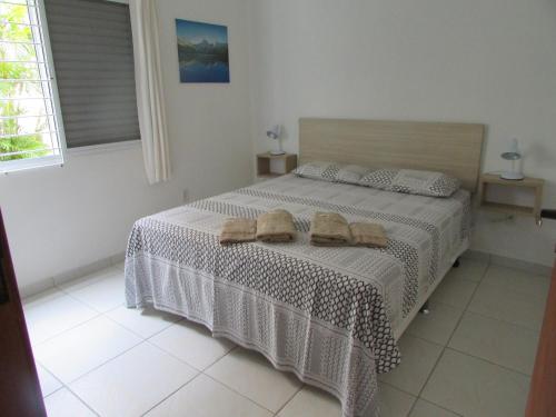 Ліжко або ліжка в номері Canto dos Pássaros Apartamentos