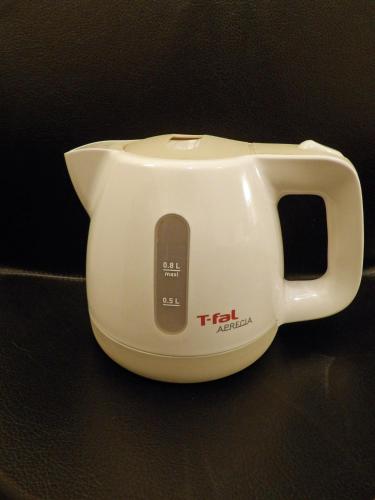 a white toaster sitting on top of a counter at Southern Cross Inn Matsumoto in Matsumoto