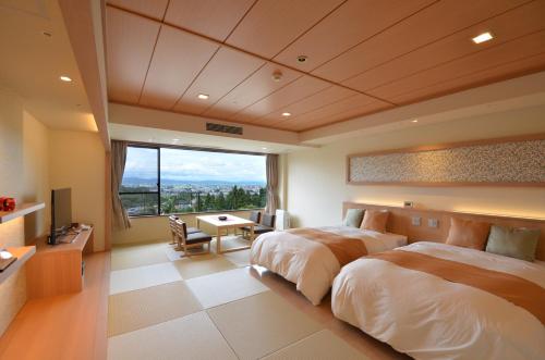 Una cama o camas en una habitación de Onyado Toho