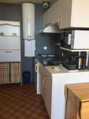 Η κουζίνα ή μικρή κουζίνα στο Residence Acapulco