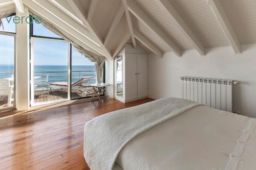 Ένα ή περισσότερα κρεβάτια σε δωμάτιο στο Casa d'Arriba