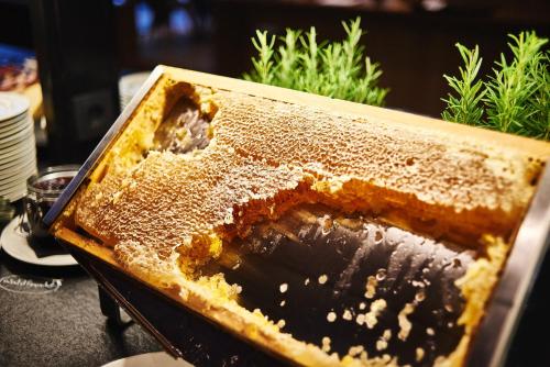 a cake sitting on top of a table at Hotel Zugbrücke Grenzau GmbH in Höhr-Grenzhausen