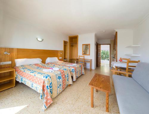 Postel nebo postele na pokoji v ubytování Apartamentos Green Line Bon Sol - AB Group