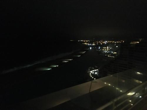 a view of an airport runway at night at Duplex Jacuzzi San Alfonso del Mar in Algarrobo