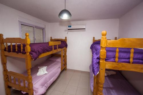 Ένα ή περισσότερα κρεβάτια σε δωμάτιο στο Maliva Cabanas