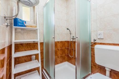 Ένα μπάνιο στο Apartments Mirica