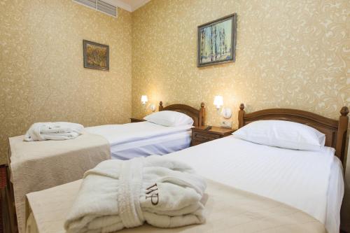 Ένα ή περισσότερα κρεβάτια σε δωμάτιο στο West Park Hotel
