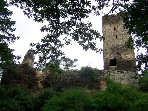 an old stone building sitting on top of a hill at Hotel Berounka in Liblín