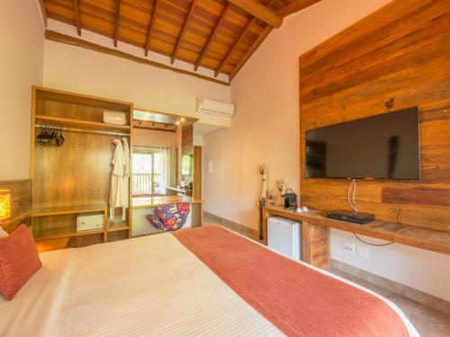Телевизор и/или развлекательный центр в Kalango Hotel Boutique