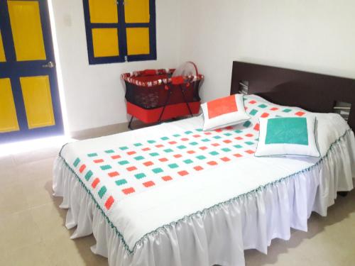 En eller flere senge i et værelse på Finca Hotel La Cuyabrita