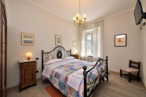 מיטה או מיטות בחדר ב-Casa Malìca