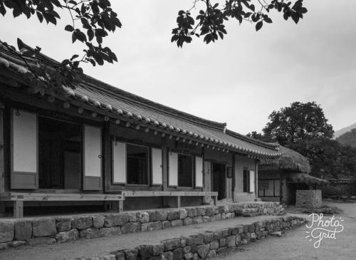 a black and white photo of a building at Jukheon Traditional House in Andong