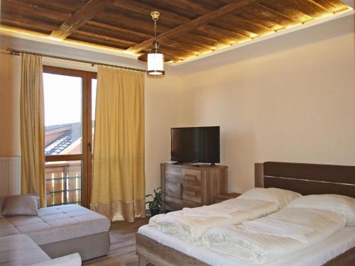 Postel nebo postele na pokoji v ubytování Villa Harmónia