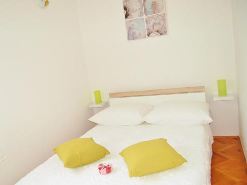 Postel nebo postele na pokoji v ubytování Apartment Stipe