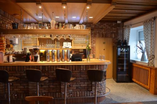 Ο χώρος του lounge ή του μπαρ στο Pension zum Strell