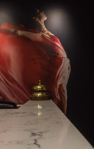 a bell sitting on top of a table at Ibis Styles Toulouse Capitole in Toulouse