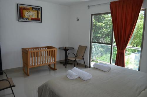 Cama o camas de una habitación en Casa Mango