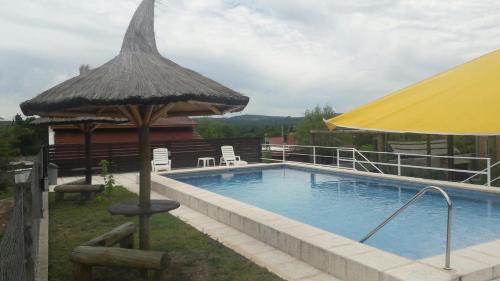 Bazén v ubytování Rio De Arena nebo v jeho okolí
