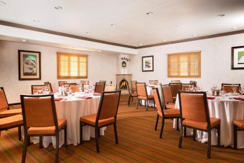 a conference room with tables and chairs in it at Hotel Santa Fe in Santa Fe