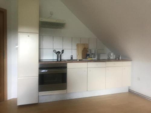 Küche/Küchenzeile in der Unterkunft Ferienwohnung am Komisenpad