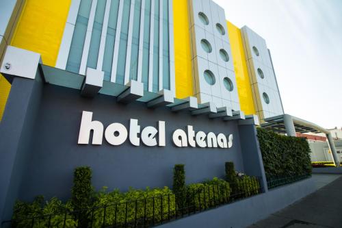a hotel alfa sign on the side of a building at Hotel Atenas Plaza in Mexico City