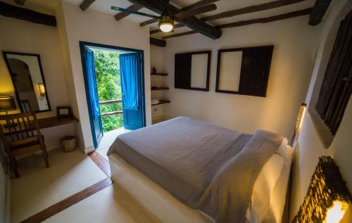 Un ou plusieurs lits dans un hébergement de l'établissement Eco Venao Lodge, Playa Venao
